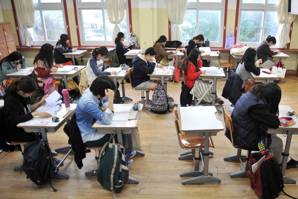 South Korean students prepare to take the standardised exam for college entrance at a high school in Seoul. Photo: AFP