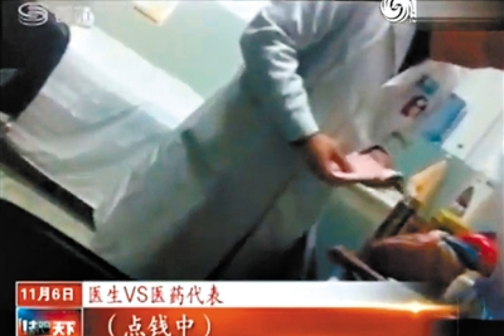 Video footage of a doctor taking bribes in Hebei's Baoding First Hospital. Photo: SCMP Pictures