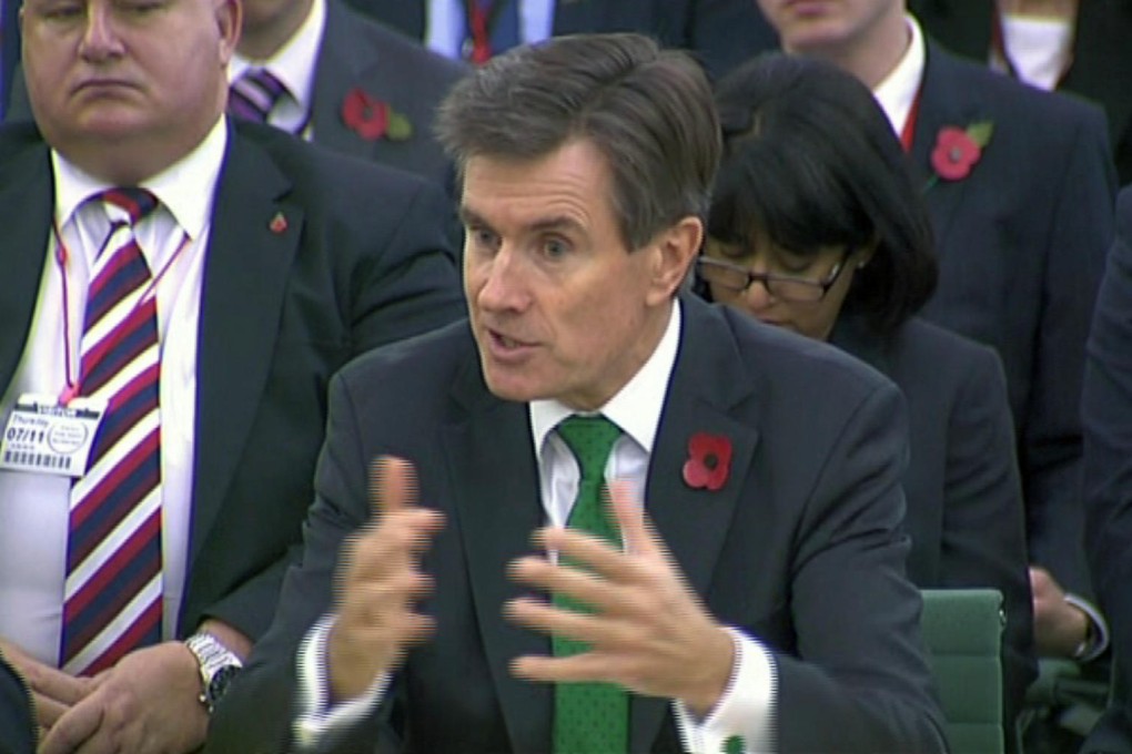 John Sawers, head of Britain's foreign spy service MI6, during the precedented joint public appearance for the three spy chiefs. Photo: AP