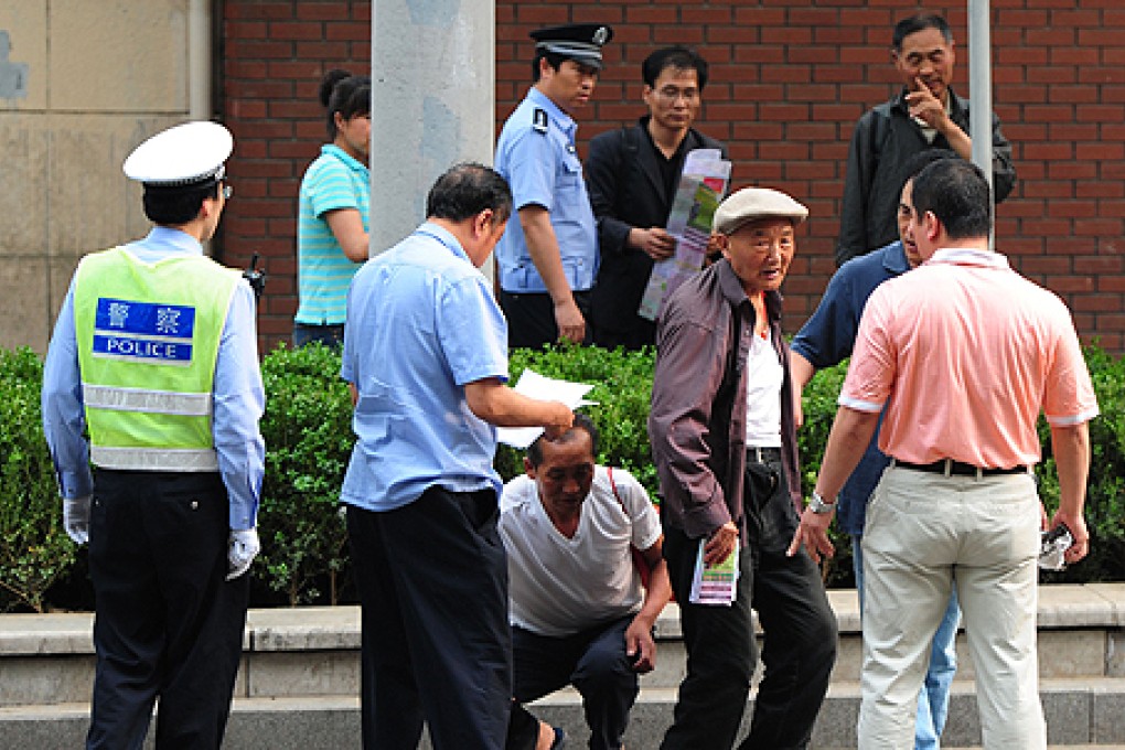 Petitioners protest over land grabs in Shandong. Photo: AFP