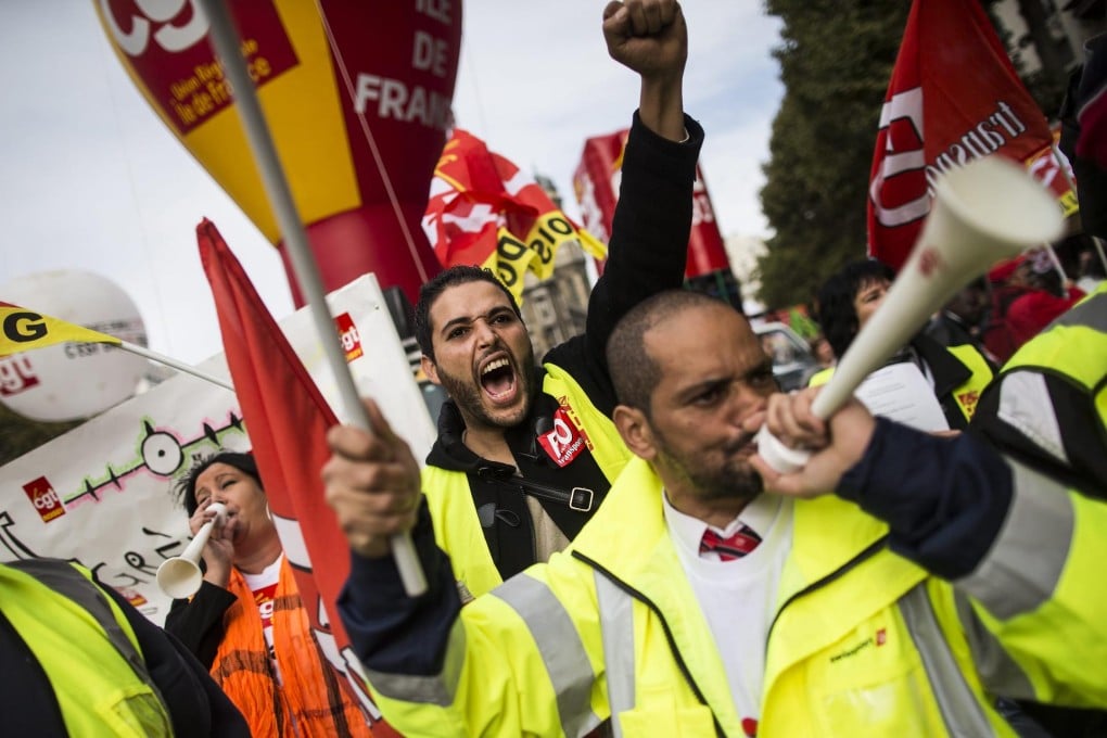 Workers protest against pension reforms in Paris as the country's government is struggling to fund its benefit programmes. Photo: EPA