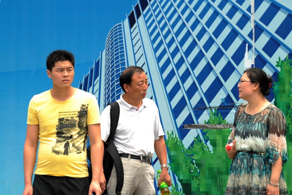 Promotions for home projects in Shanghai keep housing on residents' minds, but it is now to tougher to buy additional homes. Photo: AFP