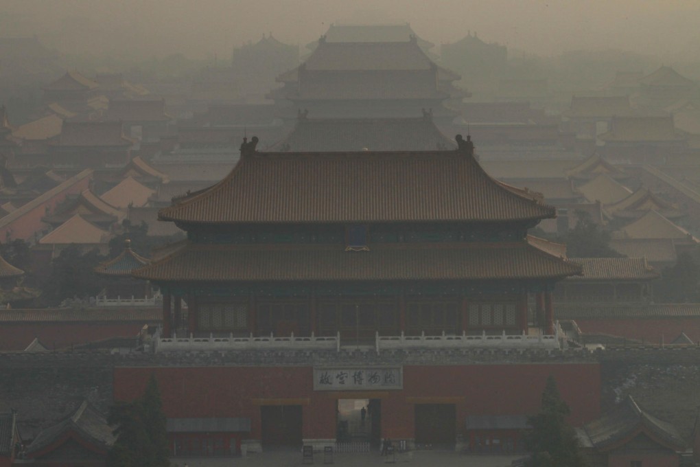 Smog shrouds the Forbidden City last month in Beijing, where residents are desperate for a solution to the pollution problem. Photo: Simon Song