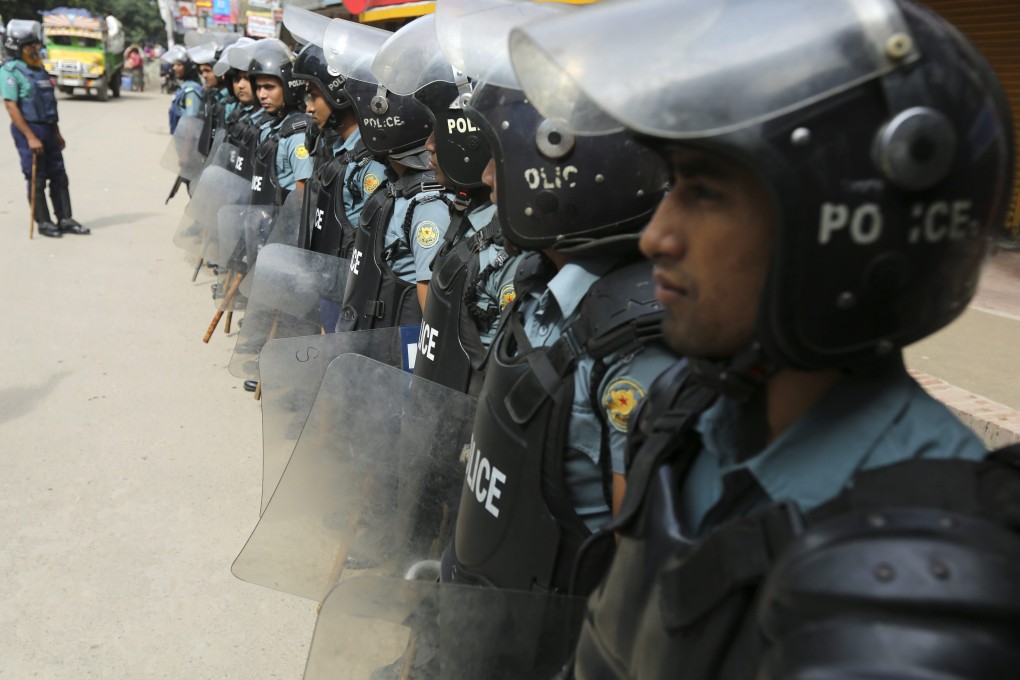 Security officials stand guard in the streets during the the first day of the countrywide shutdown called by the Bangladesh Nationalist Party. Photo: EPA