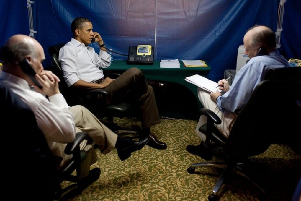 President Obama discusses the Libya air war from inside his security tent during a trip to Brazil in 2011. Photo: White House