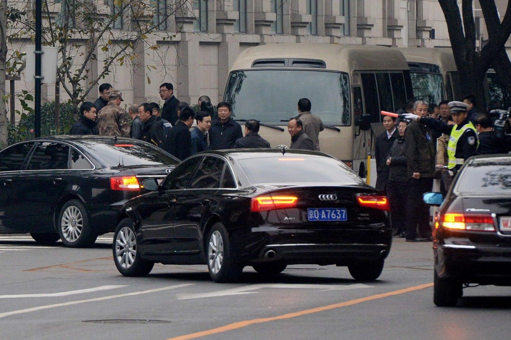 Officials arrive at the Jingxi Hotel yesterday. Photo: AFP