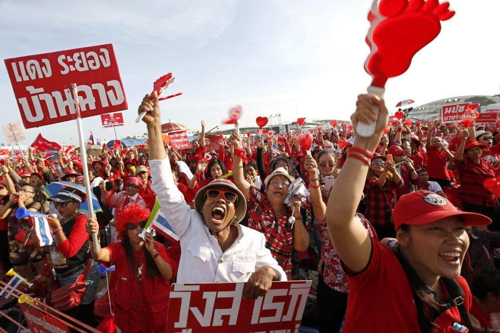 Thousands of Red Shirt protesters rally in Bangkok to show support for Yingluck Shinawatra's government. Photo: EPA