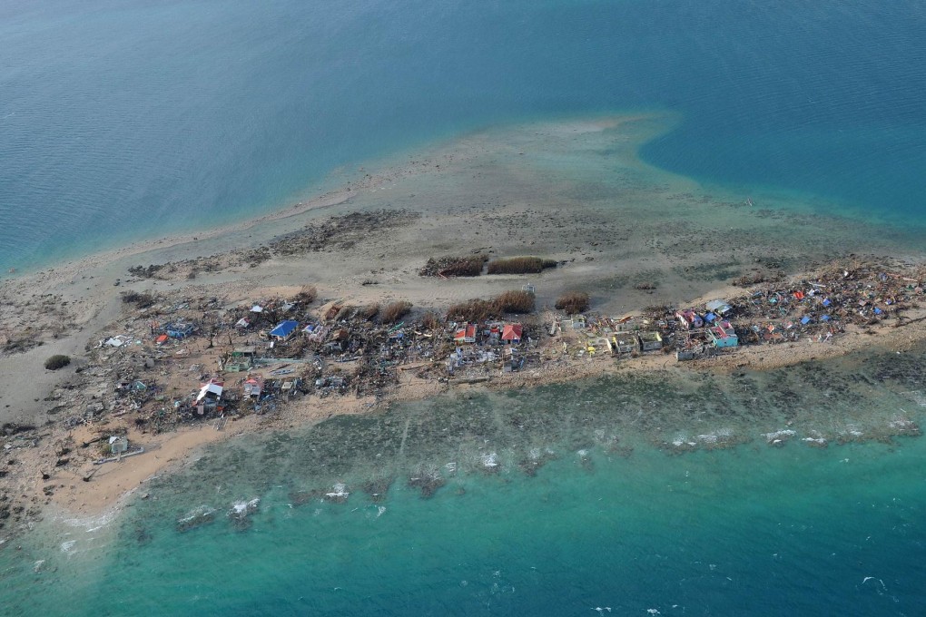 An aerial photo shows the devastation left by Haiyan on Victory Island off the town of Guiuan in Eastern Samar province. More than 10,000 people are feared dead in Leyte province alone. Photo: AFP
