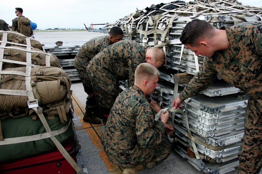 US Marine Corps soldiers check emergency and rescue supplies in Okinawa, Japan, before departing for a humanitarian assistance and disaster relief mission to the Philippines. Photo: EPA