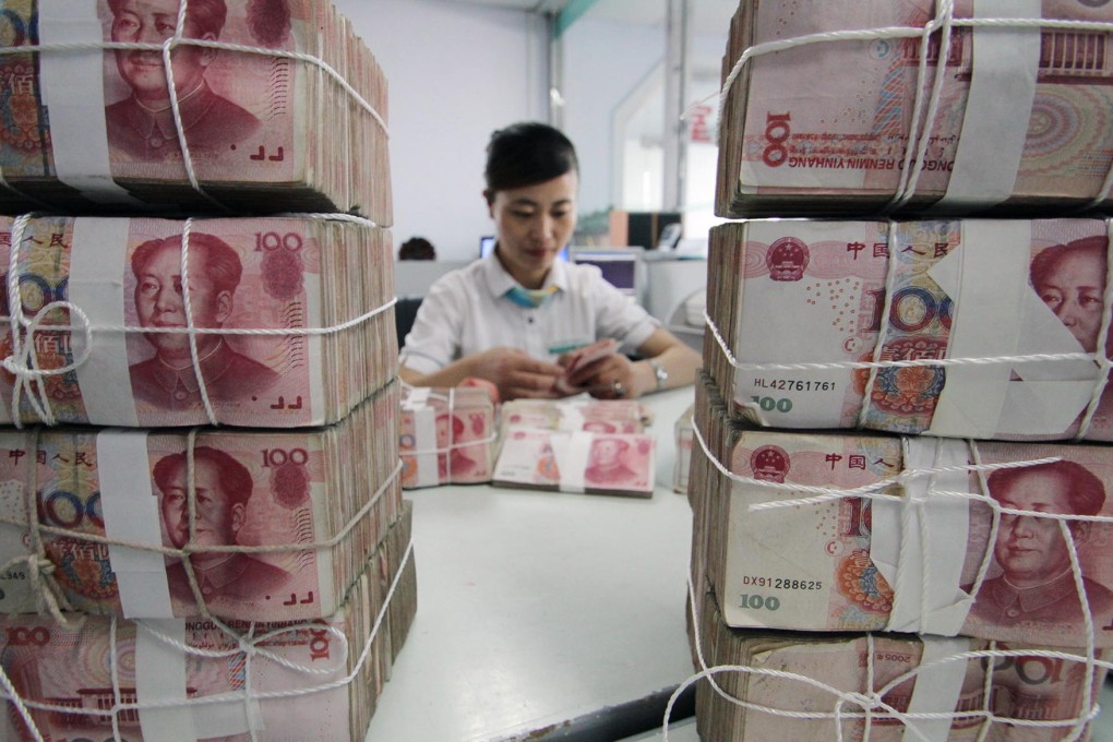 The mainland recorded a less-than-expected 506.1 billion yuan in new loans last month as monetary policies tightened. Photo: Xinhua