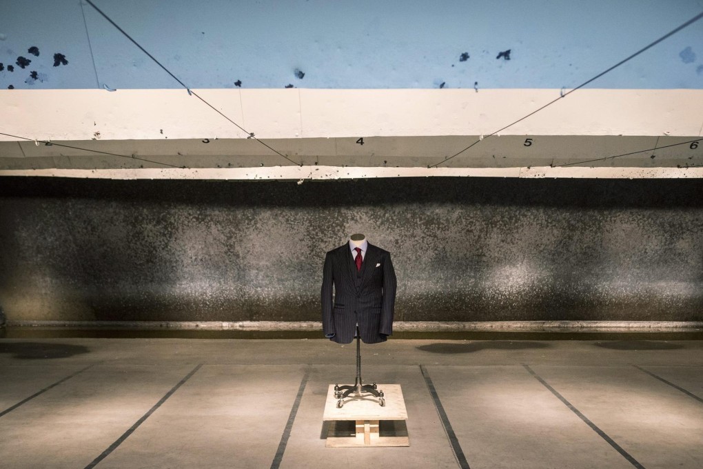 A bulletproof suit made by Canadian tailor Garrison Bespoke is tested on a gun range in Ajax, Ontario, at the launch yesterday. Photo: AP