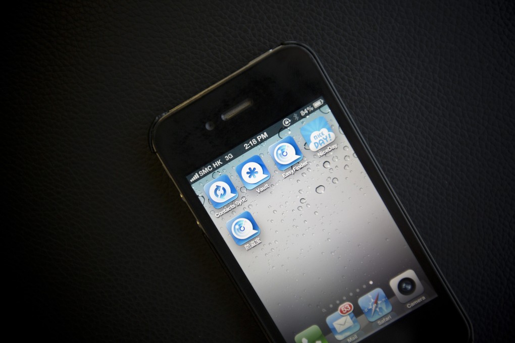 Apps produced by NQ Mobile Inc. are arranged for a photograph on an iPhone 4S in Hong Kong. Mainland company Tarena is planning an IPO after hiring the former CFO of NQ Mobile. Photo: Bloomberg