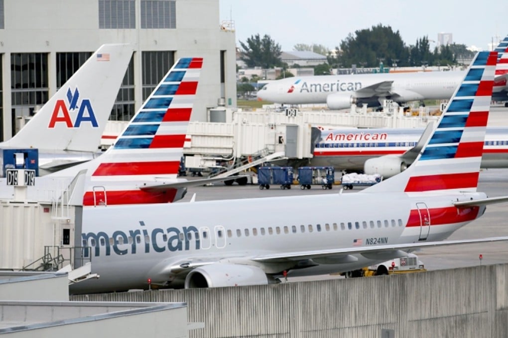 The merger will allow American Airlines to emerge from bankruptcy. Photo: AFP