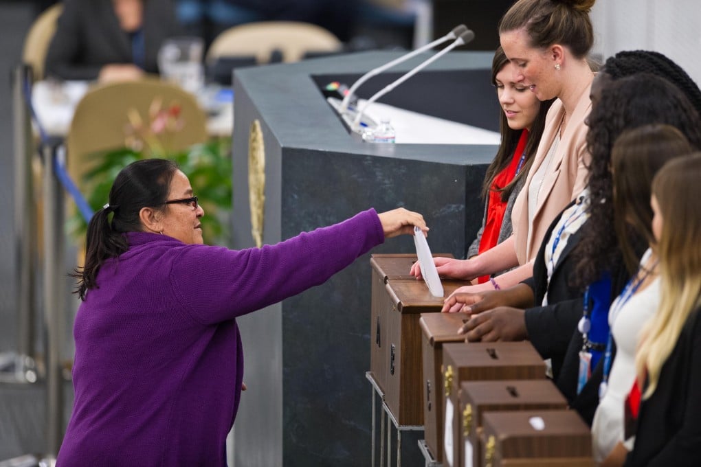 A delegate casts her vote during the United Nations Human Rights Council election at the UN headquarters in New York. Photo: Xinhua