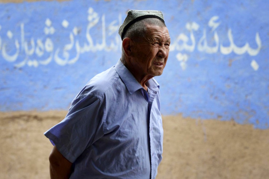 Xinjiang's Turkic-speaking Muslim Uygurs complain Beijing's hard-line governance is feeding a vicious cycle of hatred and fear. Photo: AFP