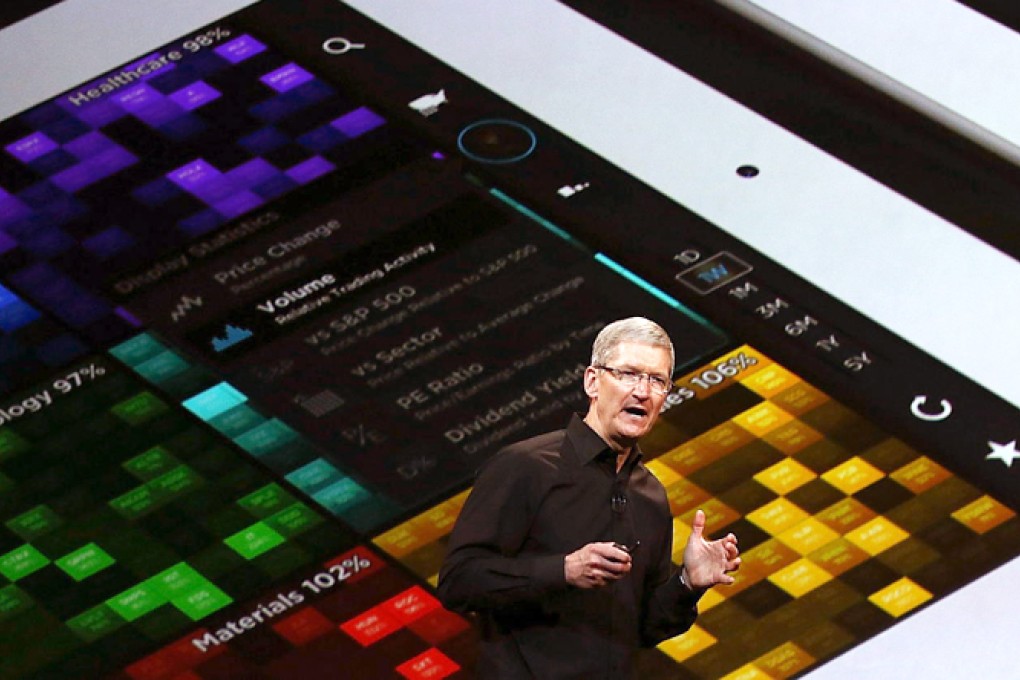 Apple chief Tim Cook in full sales pitch at a product launch last month, but device maker Hon Hai Precision Industry sees its future higher up the value chain. Photo: AFP