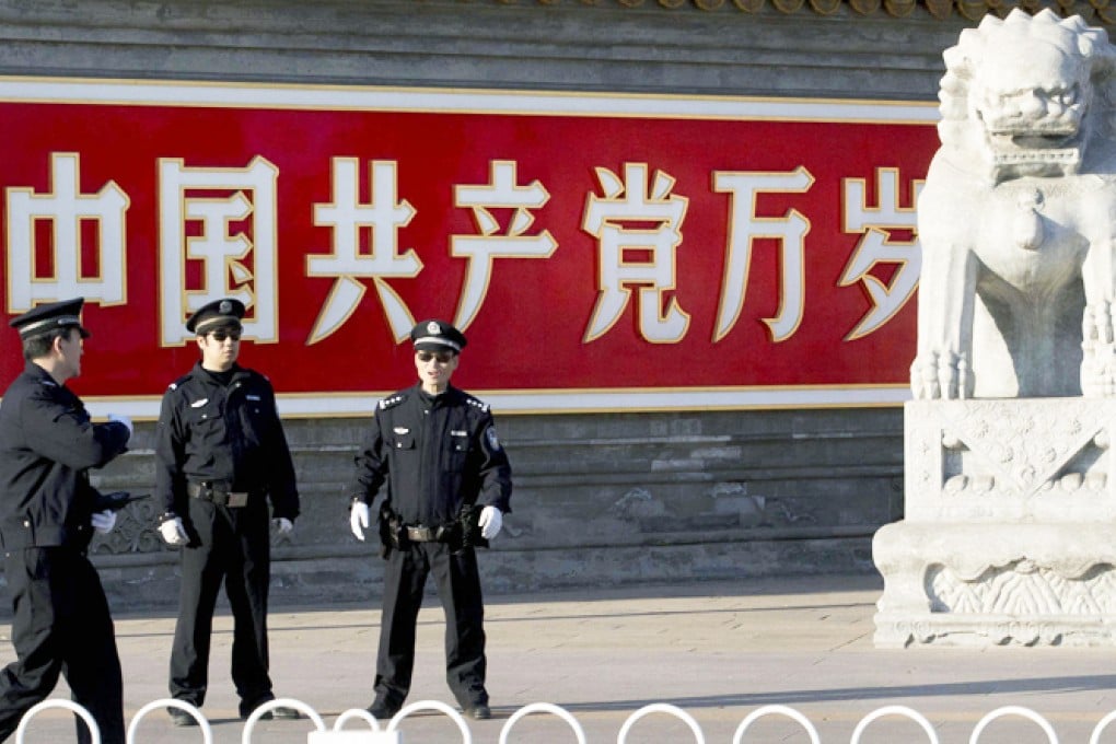Policemen guard the entrance to Zhongnanhai. Photo: AP