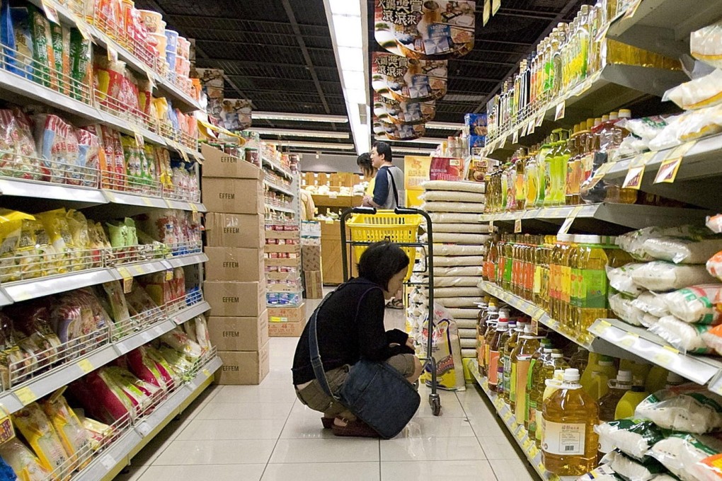 Rising wage costs cut profit at China Resources' retail division.