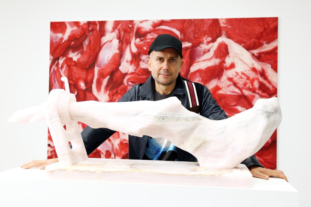 Quinn with his sculpture The Invention of Carving (front) and Flesh Painting. Photos: Edmond So