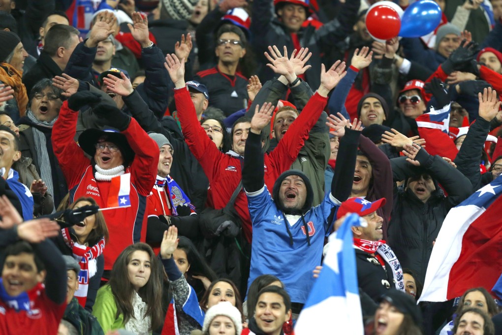 Chile's fans celebrate during the international friendly match between England and Chile at Wembley Stadium in London. Photo: AP