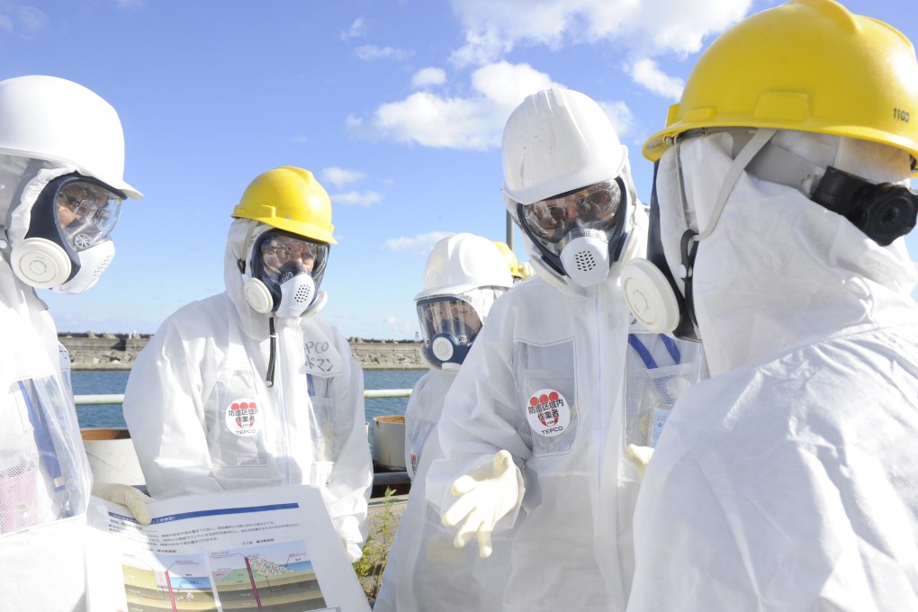 Workers at Tepco's Fukushima crippled nuclear plant. Photo: