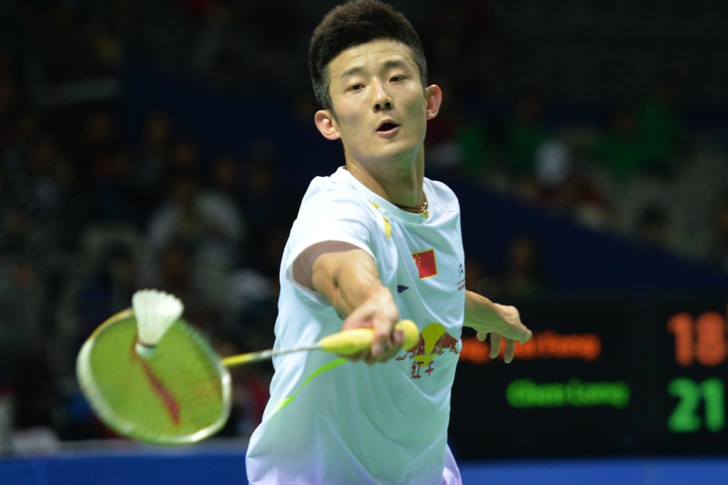 Chen Long of China hits a return to Wei Feng Chong of Malaysia in the men's singles semi-final at the China Open. Photo: AFP
