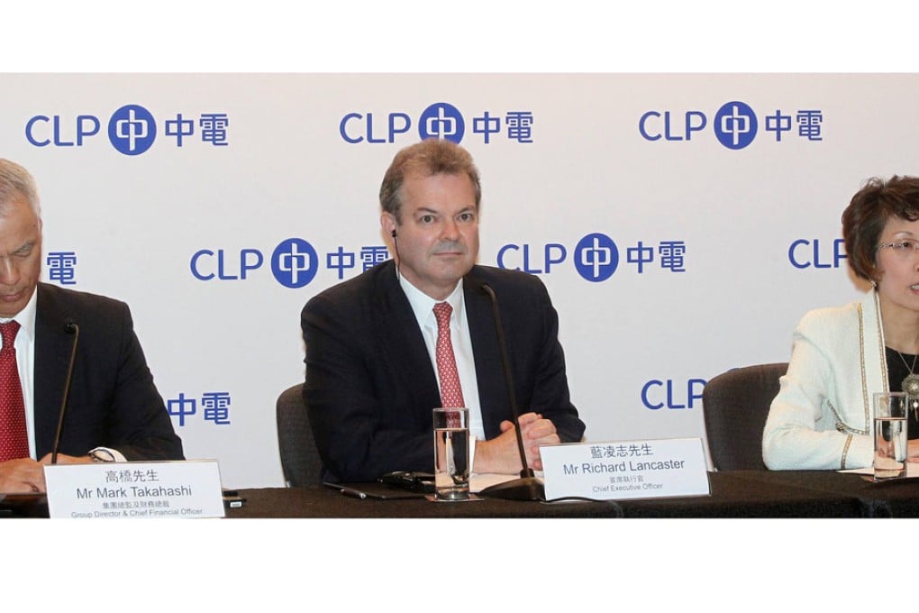 CLP Group director Mark Takahashi, CLP Power chief executive Richard Lancaster and CLP Power vice-chairwoman Betty Yuen So Siu-mai yesterday. Photo: SCMP Pictures