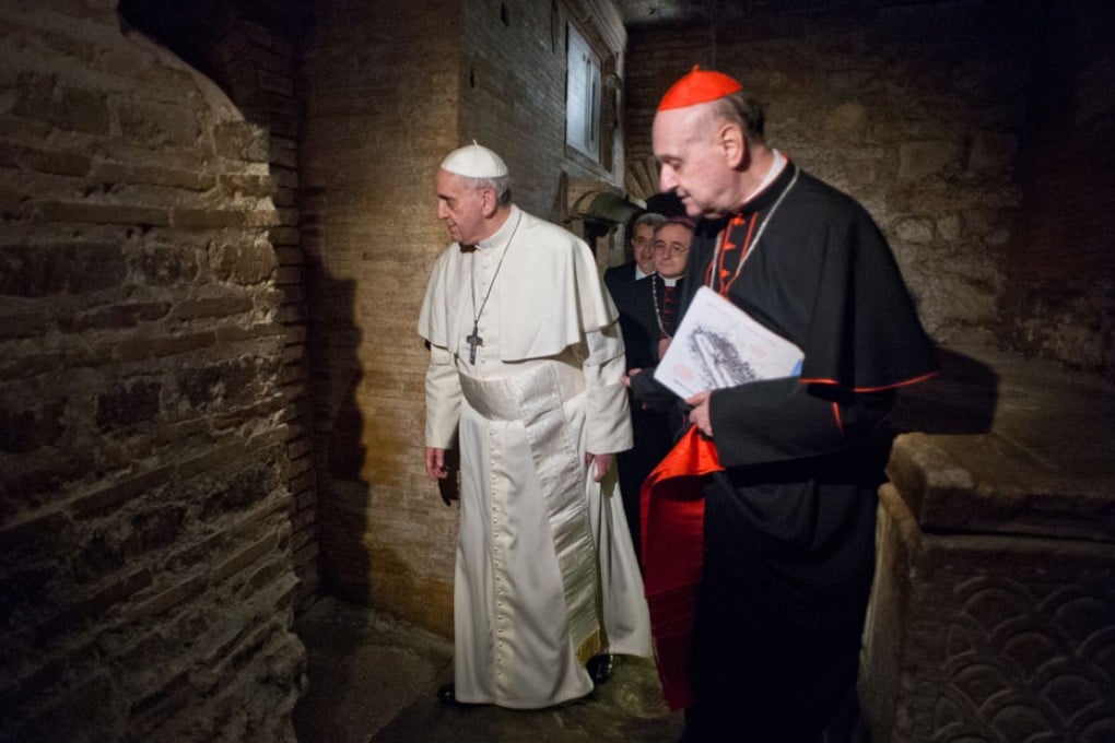 Pope Francis visits the necropolis under St Peter's Basilica at the Vatican where St Peter is believed to be buried. Photo: AP
