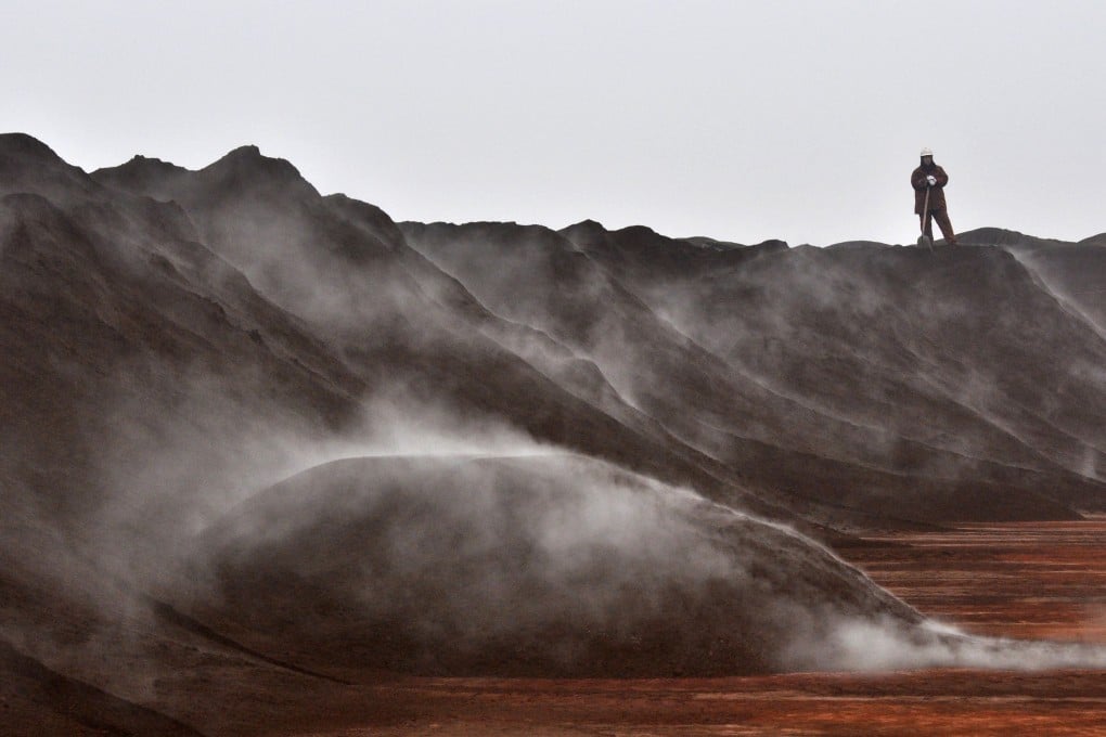 Iron ore is unloaded at Tianjin Port. Aluminium producer Chalco. Photo: Reuters