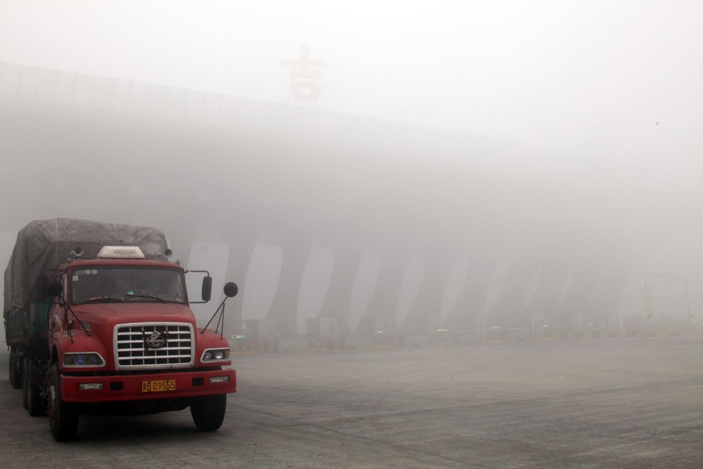 Zhang Wenjun’s sand-laden lorry weighed 160 tonnes when the bridge he was driving across collapsed. Photo: AFP