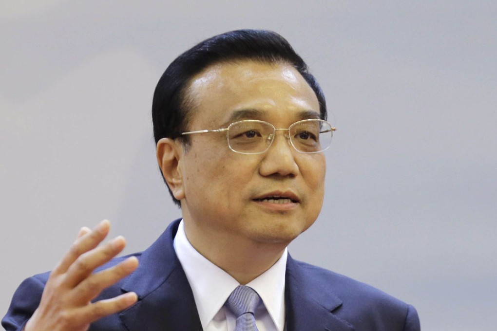 In a meeting chaired by Premier Li Keqiang, the State Council decided to give the Ministry of Land and Resources overall authority over the registration of land, buildings, prairies, forests and coastal waters. Photo: AFP