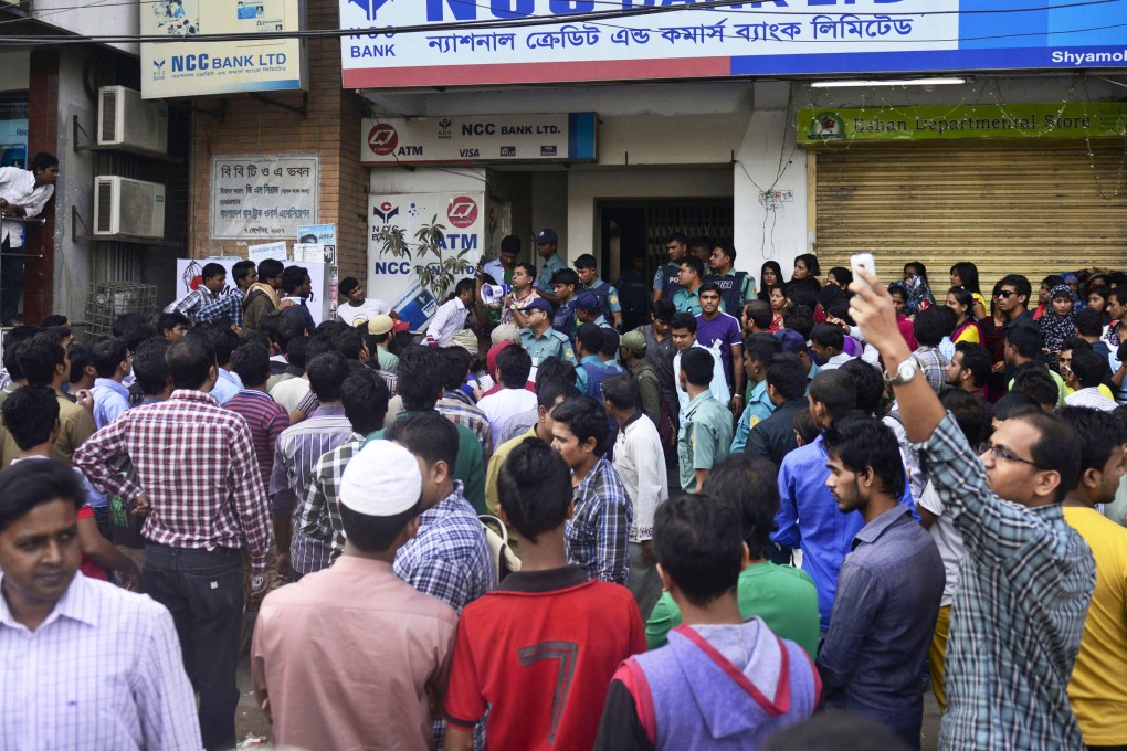 Cricket fans in Dhaka wait to buy tickets for the Twenty20 World Cup tournament to be held in Bangladesh in March next year. Photo: AP