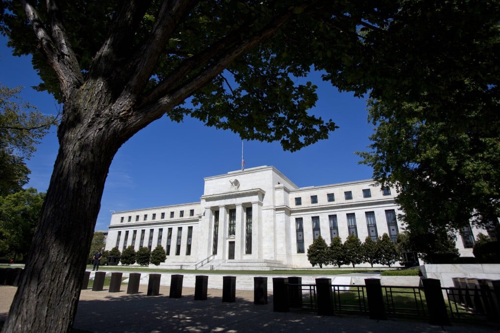 Fed members wrestled with how to assure investors that even after it cuts back on the US$85 billion a month in bond buys, the Fed still intends to keep its short-term rate near record lows. Photo: EPA