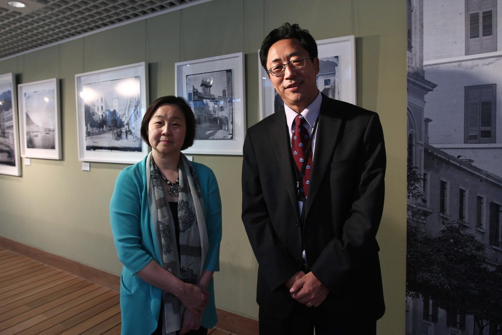 Curator Betty Yao and the Maritime Museum's Jiao Tianlong with the exhibition. Photo: Jonathan Wong