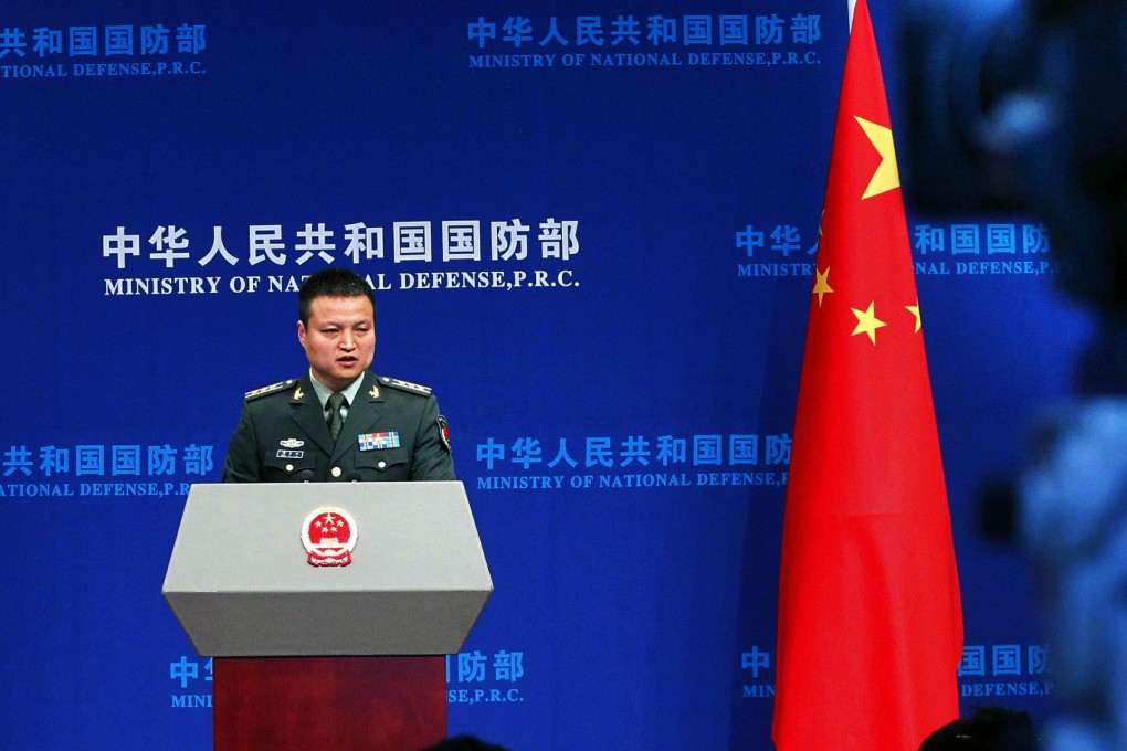 Yang Yujun , spokesman for the Ministry of National Defence, briefs reporters at a recent Beijing news conference. Photo: CNS