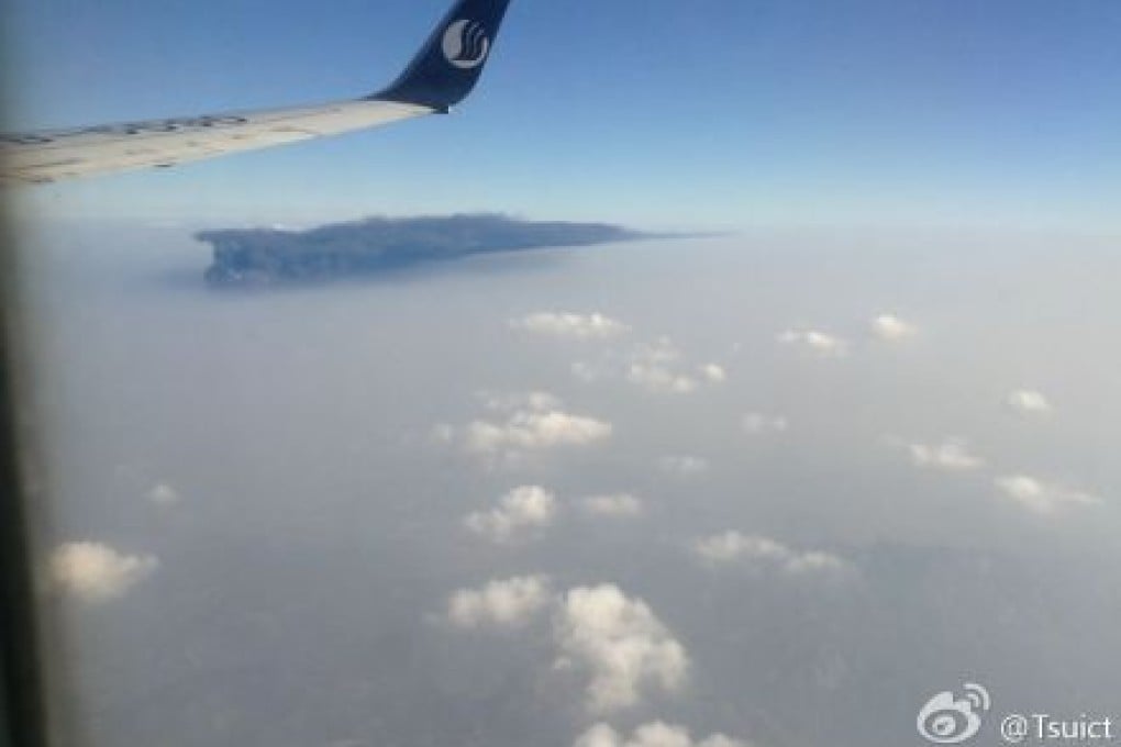 Explosion reportedly seen from a passing airplane. Screenshot via Sina Weibo