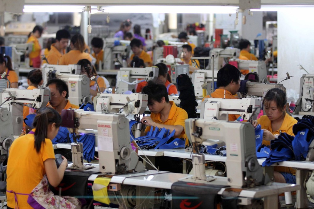 Activity in the mainland's vast factory sector grew at a milder pace this month in the wake of shrinking new export orders. Photo: AFP