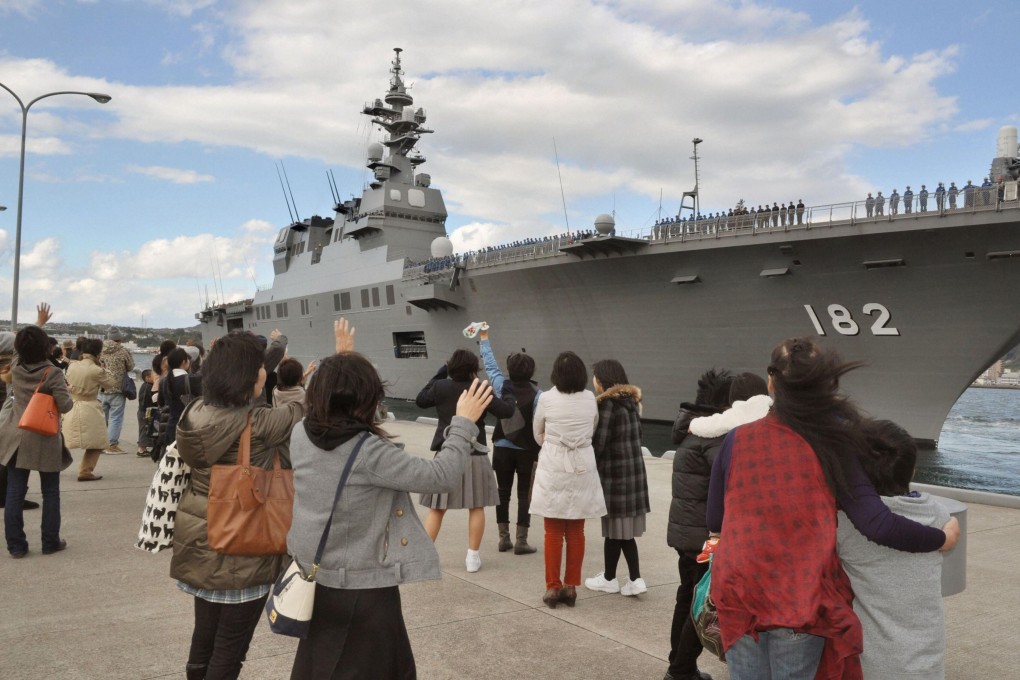 JMSDF helicopter destroyer Ise leaves port at Kure base in Kure, western Japan to provide aid to the Philippines in the wake of Super Typhoon Haiyan on Nov. 18, 2013. Photo: Reuters