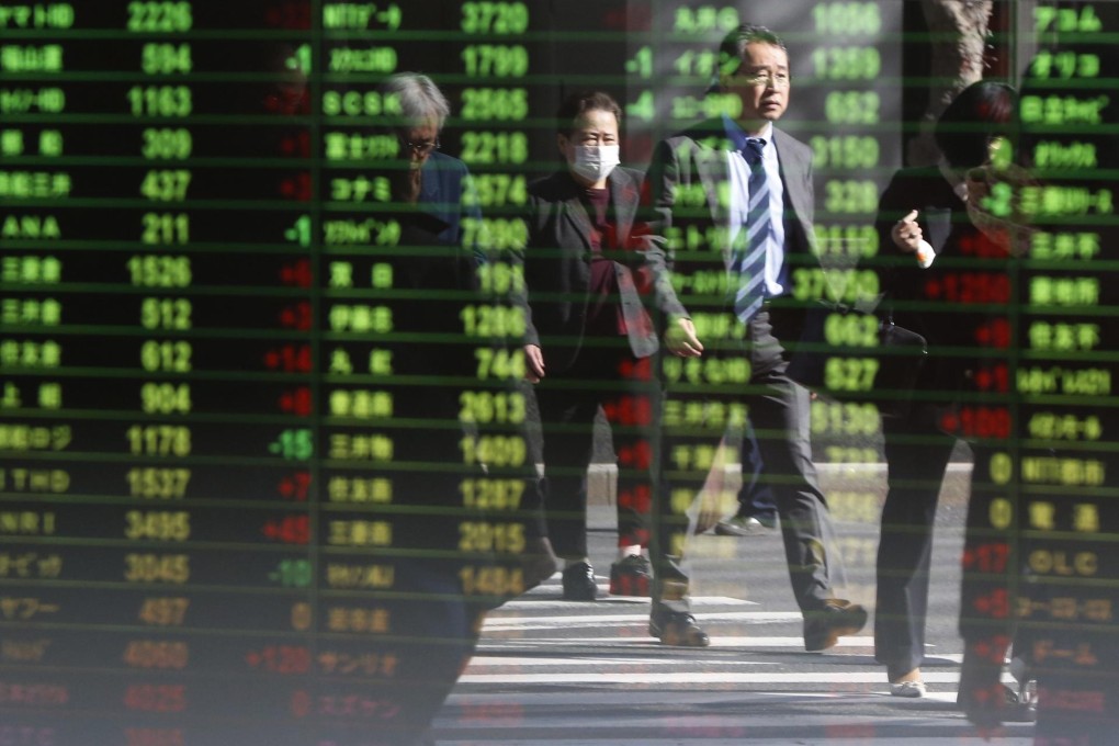 The Japanese stock market's Nikkei index climbed to near its high for the year, and the US dollar reached its highest level against the yen in four months. Photo: Reuters