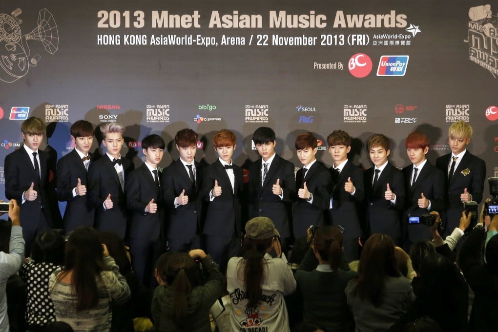 Members from South Korean K-pop group Exo pose during a news conference before Mnet Asian Music Awards. Photo: Reuters
