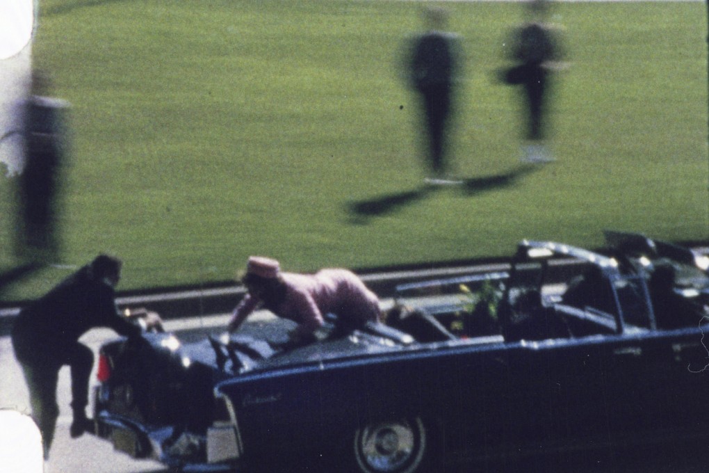 Jacqueline Kennedy reaches for her husband as the horror unfolds in Dallas. Photo: Washington Post