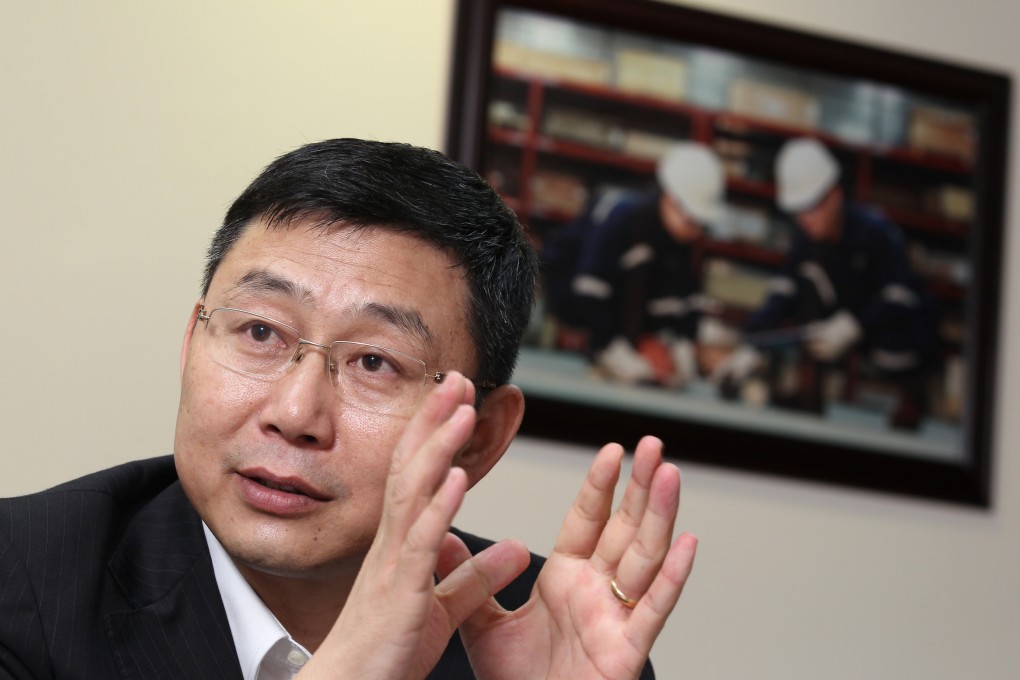 Petro-king chairman Wang Jinlong says the buyout of Sheraton will boost the services provider's profit margin. Photo: Edward Wong