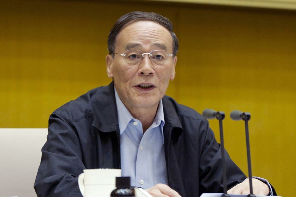Wang Qishan, head of the Communist Party's anti-corruption body, speaks at a meeting in Beijing in May 2013. Photo: Xinhua