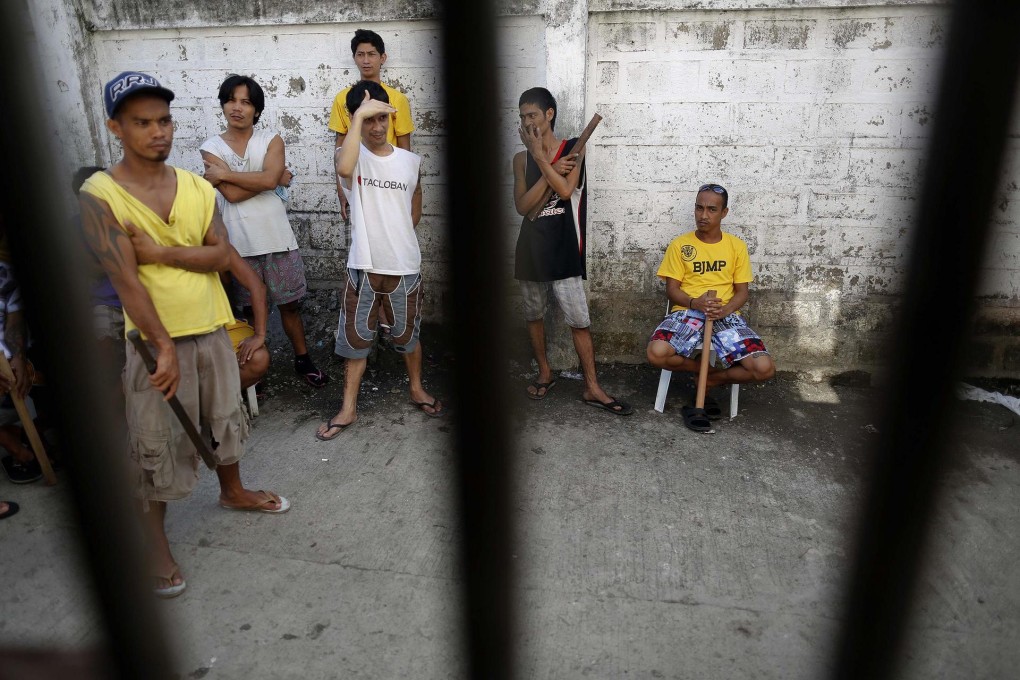 Many of the prisoners have returned after helping relatives who lost their homes during Typhoon Haiyan. Photo: Reuters