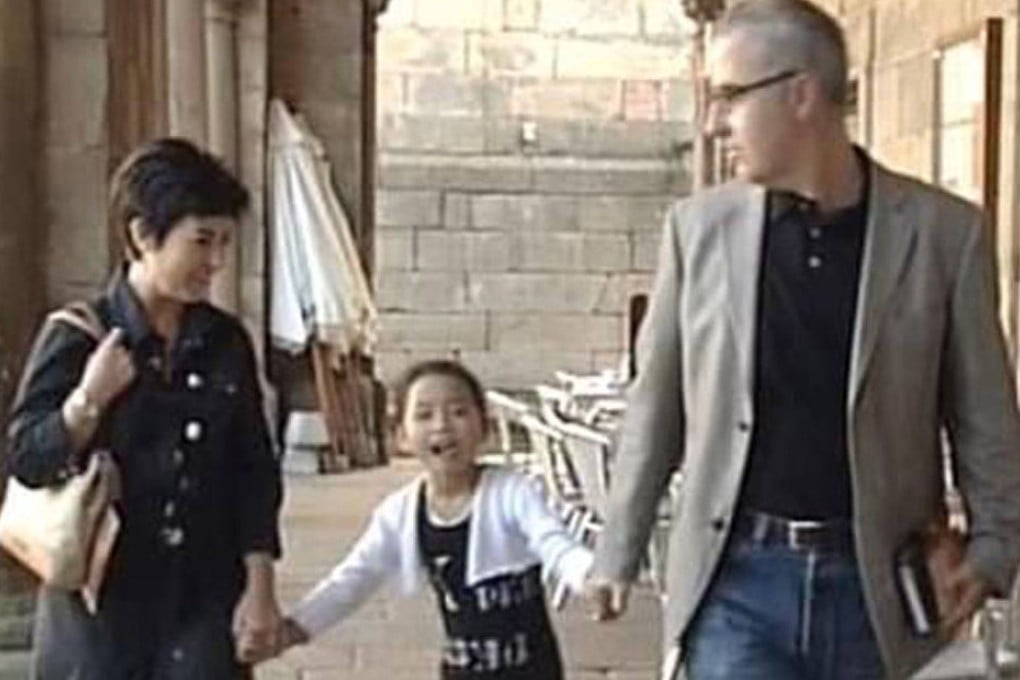 The couple and their adopted daughter. Photo: SCMP Pictures