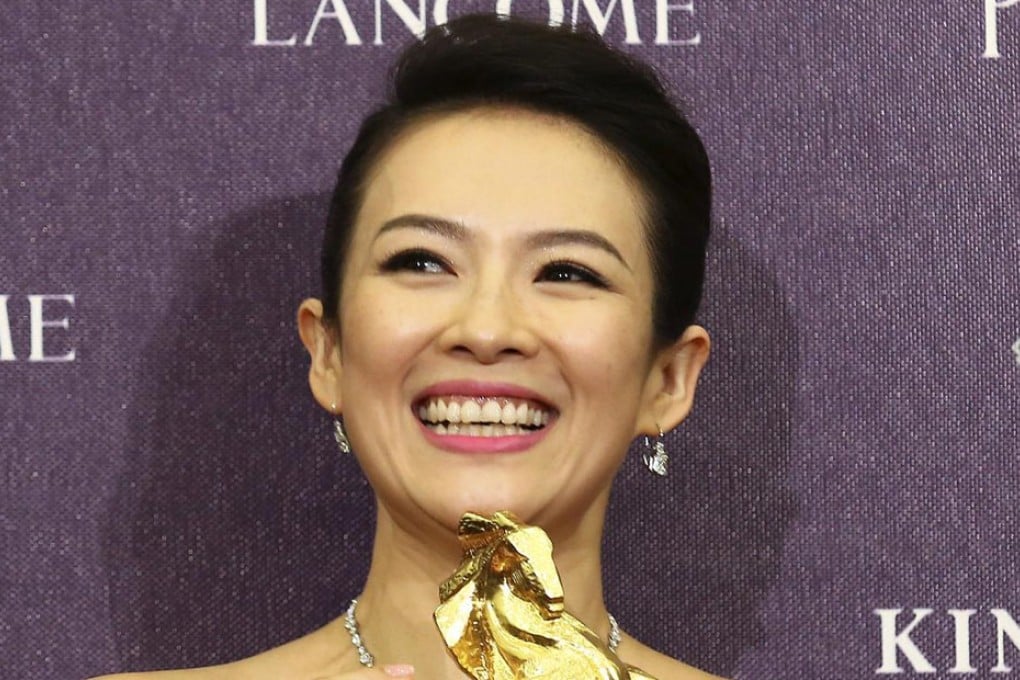 China's Zhang Ziyi celebrates winning best actress at the 50th Golden Horse Awards in Taipei last night for her part in martial arts epic The Grandmaster. Photo: Reuters