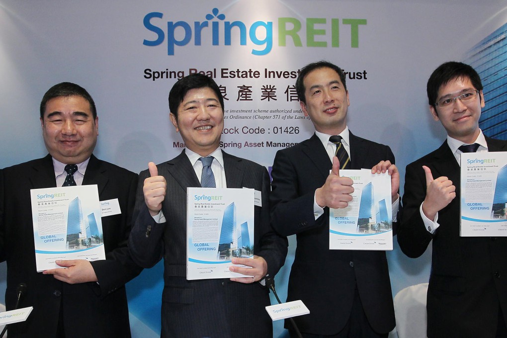 (Left to right) Spring REIT managing director Don Lau Jin-tin, chairman and non-executive director Toshihiro Toyoshima, managing director Nobumasa Saeki and senior vice-president Michael Chung Wai-fai announce the global offering in Admiralty. Photo: Edmond So
