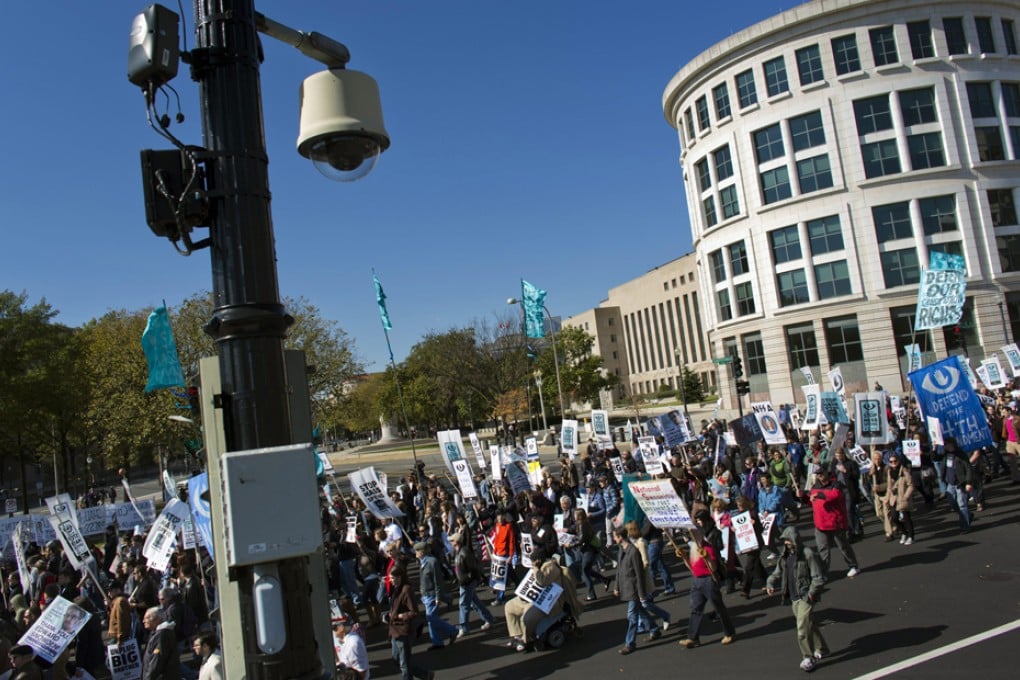 People protest against NSA surveillance on 26 October, the 12th anniversary of the signing of the USA Patriot Act. Photo: EPA