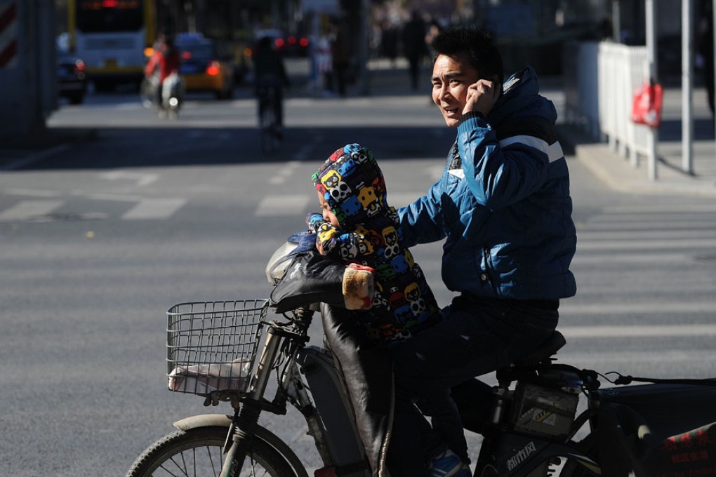The new policy allows couples to have two children if either parent is a single child. Photo: AFP