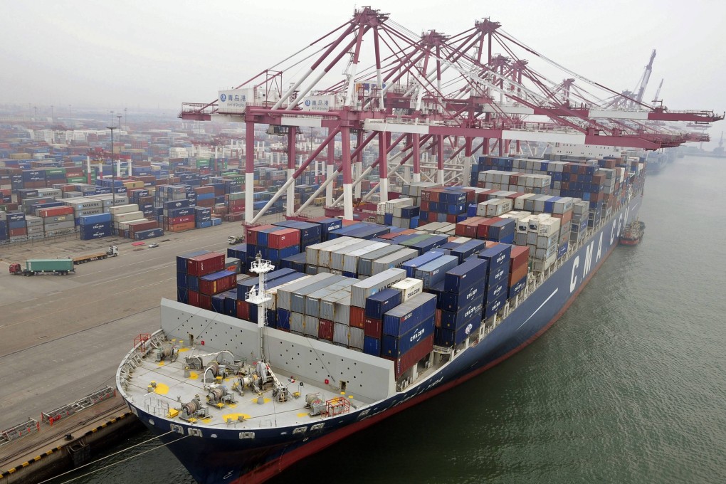 A cargo ship loaded with containers is seen anchored at a port in Qingdao, Shandong province. Photo: Reuters